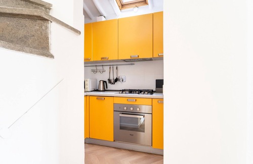 Rione XIV Borgo Apartment | Unmatched Views of St. Peter's Dome with Family-Friendly Amenities