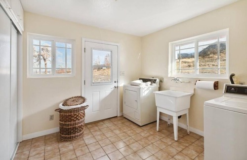 Pearblossom House | Discover The Big Sky: Pet-Friendly Retreat with Pool & Hot Tub
