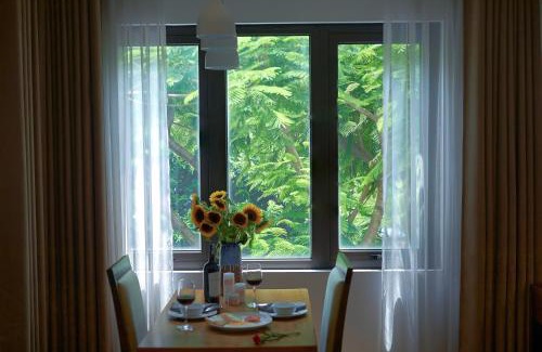 Dich Vong Apartment | Discover The Bloom Classic Hotel and Bistro: Pet-Friendly Bliss