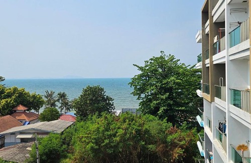 Saen Suk Apartment | Relax at The Blu X Seaview: Family-Friendly Pool Retreat