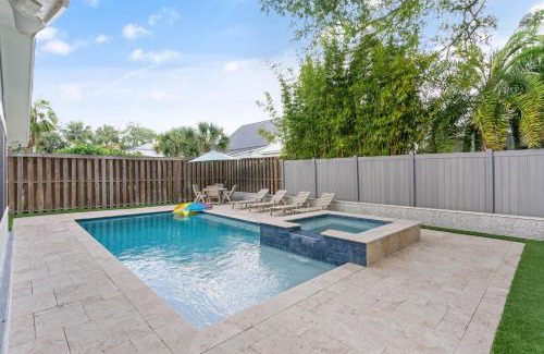 East Beach House | Relax at The Blue Door Cottage with Pool and Family Amenities