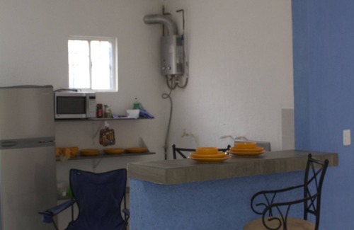 Leona Vicario Apartment | Relaxing Getaway at The Blue Frame with Kitchen Amenities