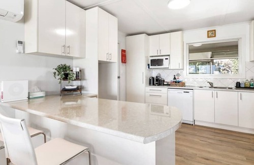 Bonney House | Experience The Blue House with Ocean & Lake Views