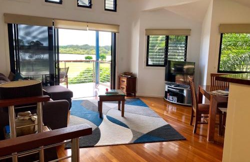 Yamba House | Experience The Boathouse: Oceanfront Escape with 9.8 Rating