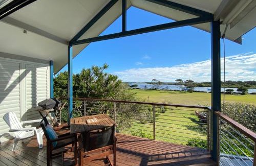 Yamba House | Experience The Boathouse: Oceanfront Escape with 9.8 Rating