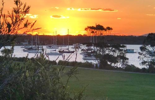 Yamba House | Experience The Boathouse: Oceanfront Escape with 9.8 Rating