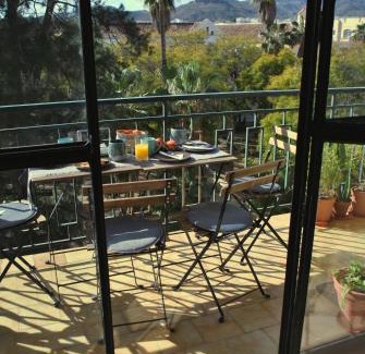 El Ejido Apartment | Trendy Boho-Chic Oasis: City Center Apartment with Kids Amenities