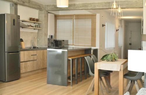 El Ejido Apartment | Trendy Boho-Chic Oasis: City Center Apartment with Kids Amenities