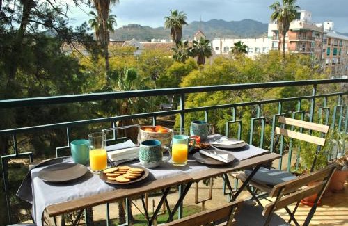 El Ejido Apartment | Trendy Boho-Chic Oasis: City Center Apartment with Kids Amenities