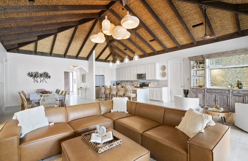 Farmer's Hill Villa | Unwind at The Breakwater: Swim-Up Pool Bar & Beach Bliss