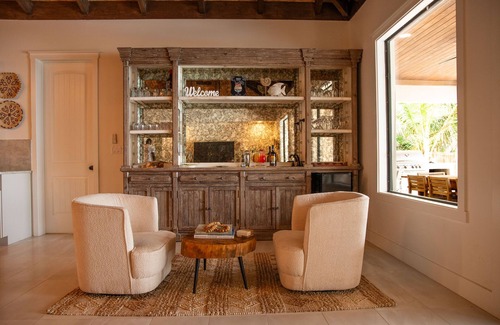 Farmer's Hill Villa | Unwind at The Breakwater: Swim-Up Pool Bar & Beach Bliss