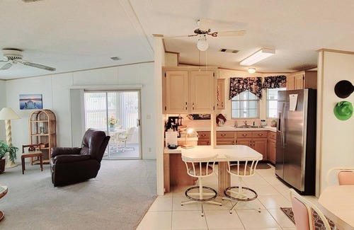 Edgewater House | Exceptional Stay at The Breezy Retreat: Spa & Breakfast Included!