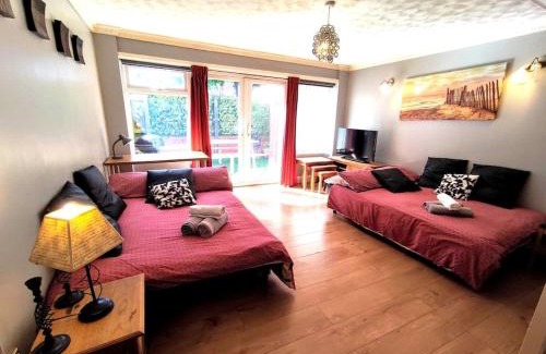 The Westside House | The Brum House: Family-Friendly Retreat with Private Garden