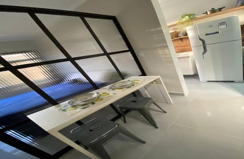 Itarare Apartment | Beachfront Kitnet with Ocean Views and Family Amenities