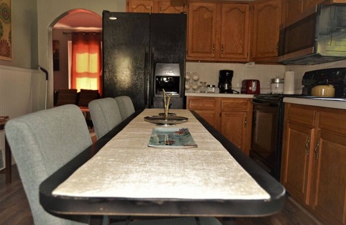 Grand Forks House | Inviting Bungalow Retreat with Backyard BBQ and Family Perks