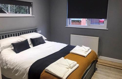Otterburn House | Experience The Bunker: Pet-Friendly Retreat with Spa Amenities