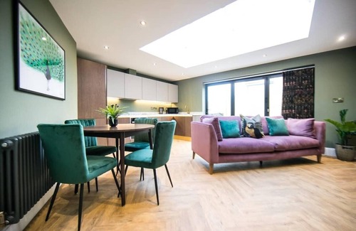 Buxton Apartment | Indulge in The Buxton Suite with Spa & Hot Tub Amenities
