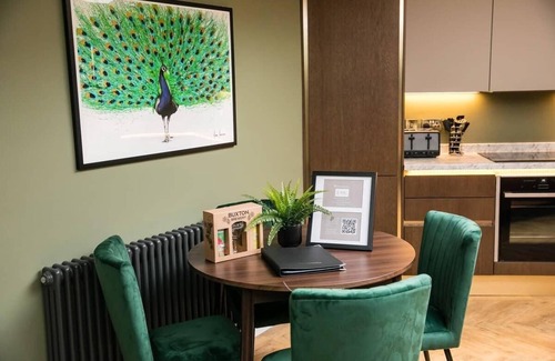 Buxton Apartment | Indulge in The Buxton Suite with Spa & Hot Tub Amenities