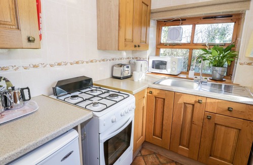 Rhosybol Cottage | Cozy The Byre: Character Cottage with Open Fire in Dulas