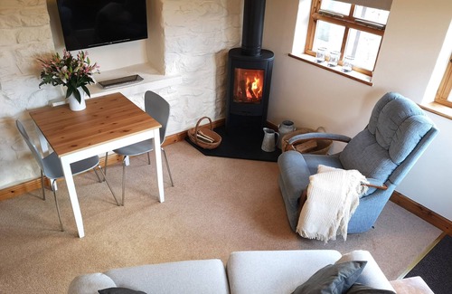 Rhosybol Cottage | Cozy The Byre: Character Cottage with Open Fire in Dulas