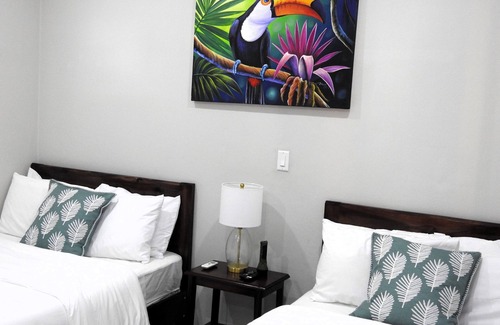 Independence and Mango Creek Hotel | Unforgettable Stays at The Toucan Inn with Spa & Dining