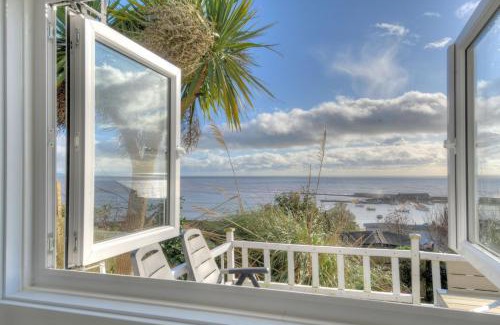Lyme Regis House | Discover The Cabin: A 4-Star Retreat with Great Reviews