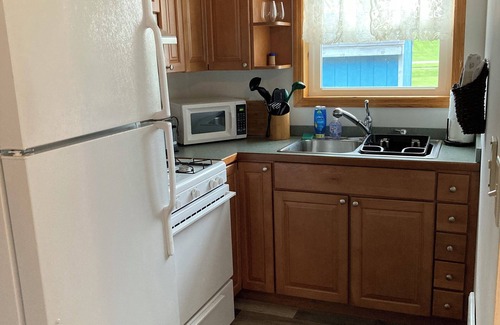 Sylvan Beach House | Exceptional Canal View Cottage with Pool and Spa Retreat
