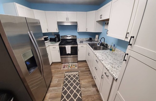 Carrabelle Apartment | Unforgettable Stays at The Captains Quarters with Pool & Breakfast