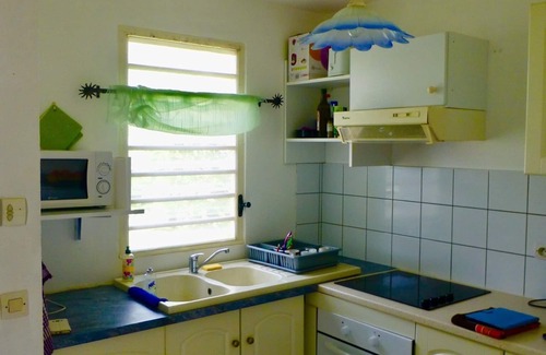 Saint-Claude Apartment | Inviting The Caribbean Flower: Oceanfront Escape with Pool