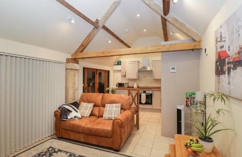 Biddestone House | Discover Family-Friendly Comfort at The Cattle Byre Hotel