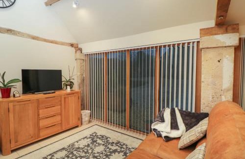 Biddestone House | Discover Family-Friendly Comfort at The Cattle Byre Hotel