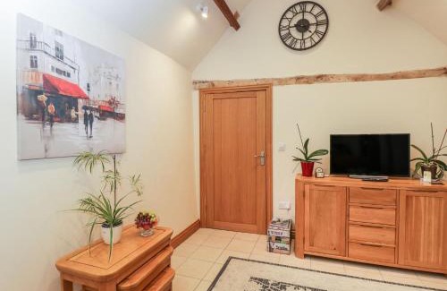 Biddestone House | Discover Family-Friendly Comfort at The Cattle Byre Hotel