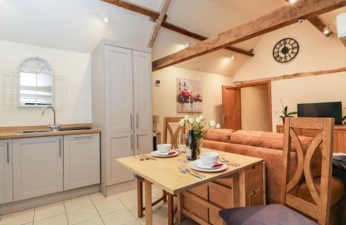 Biddestone House | Discover Family-Friendly Comfort at The Cattle Byre Hotel