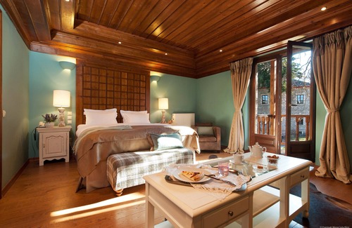 Pertouli Hotel | Experience The Chatzigaki Manor: 5-Star Elegance & Pool