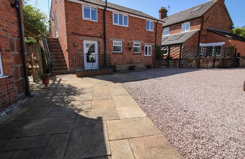 Burlton Cottage | Pet-Friendly Coach House with Garden in Burlton Awaits