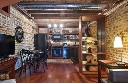 South of Broad Cottage | Historic Coach House 1755: Oceanfront Pool & Spa Retreat