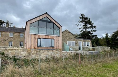 Powburn House | Inviting Coach House: Family-Friendly with 9.5/10 Rating