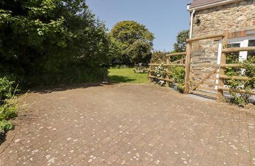 Haverfordwest Cottage | Pet-Friendly Coach House with Cozy Open Fire in Wolfscastle