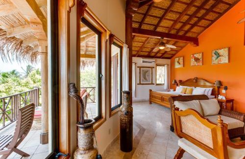 Sittee River Village Hotel | Discover The Colonial at Jaguar Reef: Oceanfront Retreat
