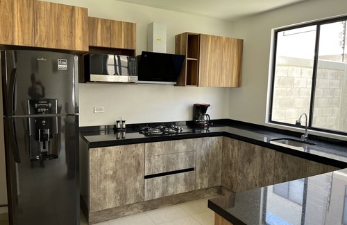 Queretaro House | Cozy Corner House: Family-Friendly with Kitchen Amenities