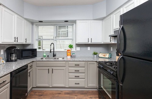 Des Moines House | The Cow Tipper: Family-Friendly Getaway with Spa & Game Room