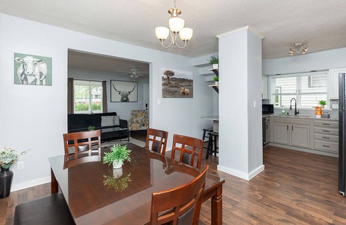 Des Moines House | The Cow Tipper: Family-Friendly Getaway with Spa & Game Room