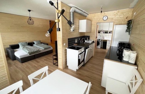 Salla House | Inviting Loggers Suite with Lake View and Spa Amenities