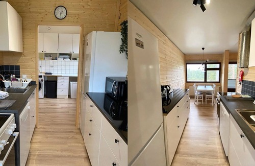 Salla House | Inviting Loggers Suite with Lake View and Spa Amenities