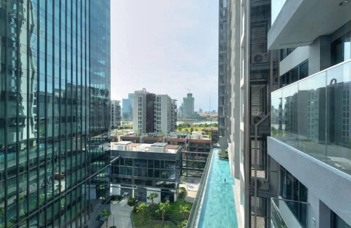 Ho Chi Minh City Apartment | Indulge in The Crest Lux: Bathtub with City Views