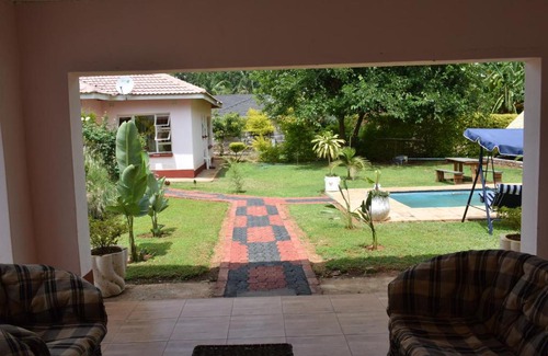 Harare House | Cozy Crown Inn Guest House with Oceanfront Amenities