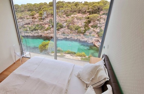 Cala Pi Villa | Experience the Crystal Bay: Oceanfront Villa with Pool
