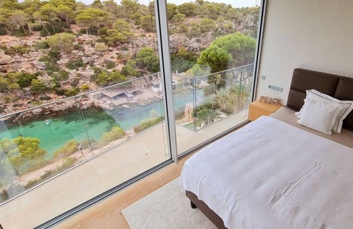 Cala Pi Villa | Experience the Crystal Bay: Oceanfront Villa with Pool