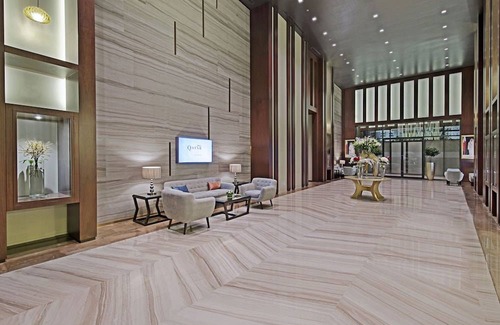 Diplomatic Area Hotel | Elegant Stay at The Curve Hotel with Pool & Kitchen Amenities