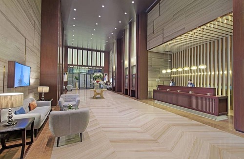 Diplomatic Area Hotel | Elegant Stay at The Curve Hotel with Pool & Kitchen Amenities